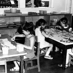 12 children at tables with puzzles 2
