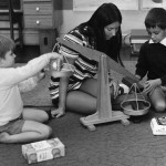 14 teacher with 2 children & scales pic