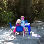 27 ASVP3420 Girls sitting in garden