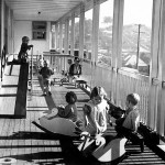 3 children playing on the verandah pic
